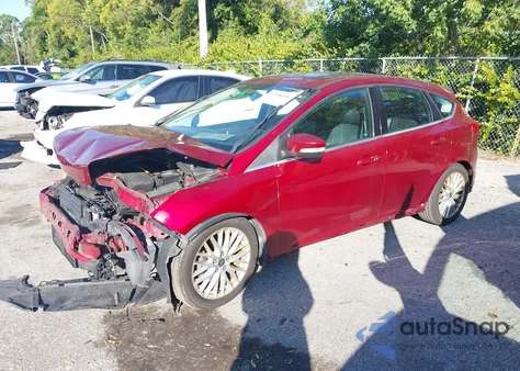 2014 Ford Focus Titanium from USA, damaged, VIN 1FADP3N2XEL447942